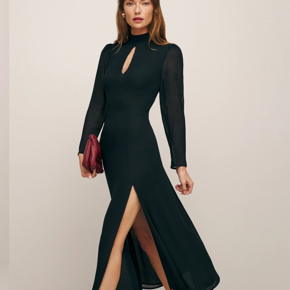 Reformation Castalia Dress in black. Size 6. Worn twice. Sold out online.